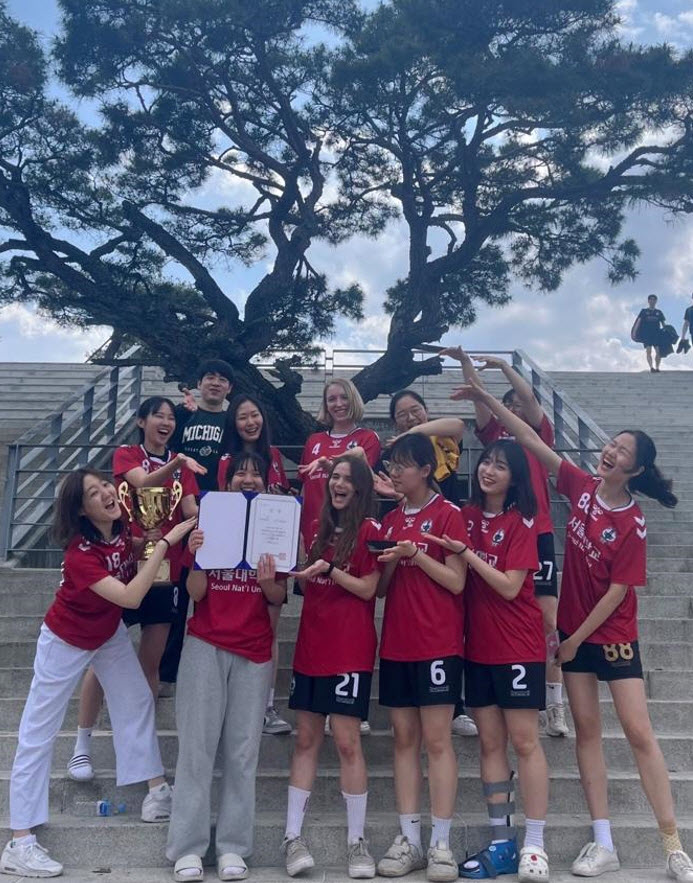 The SNU Women’s Handball Team celebrating their victory at the 2023 National University Handball Championships