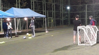 Soccer Club booth (Student far left playing the shooting game)
