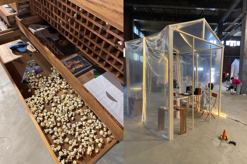 An installation of vinyl greenhouses and elaborate drawer compartments