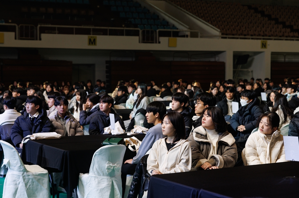 Freshmen listening to a lecture