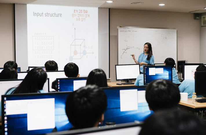 Students are taking lectures from a graduate student